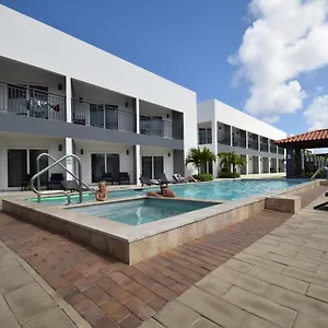 https://arena-condos-aruba.comcaribbean.com